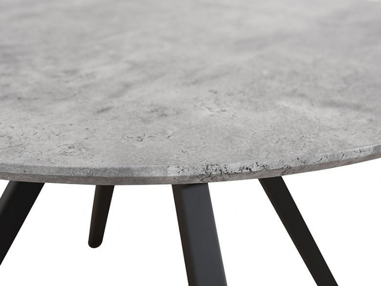 Zetta grey round table available at Furniture Barn